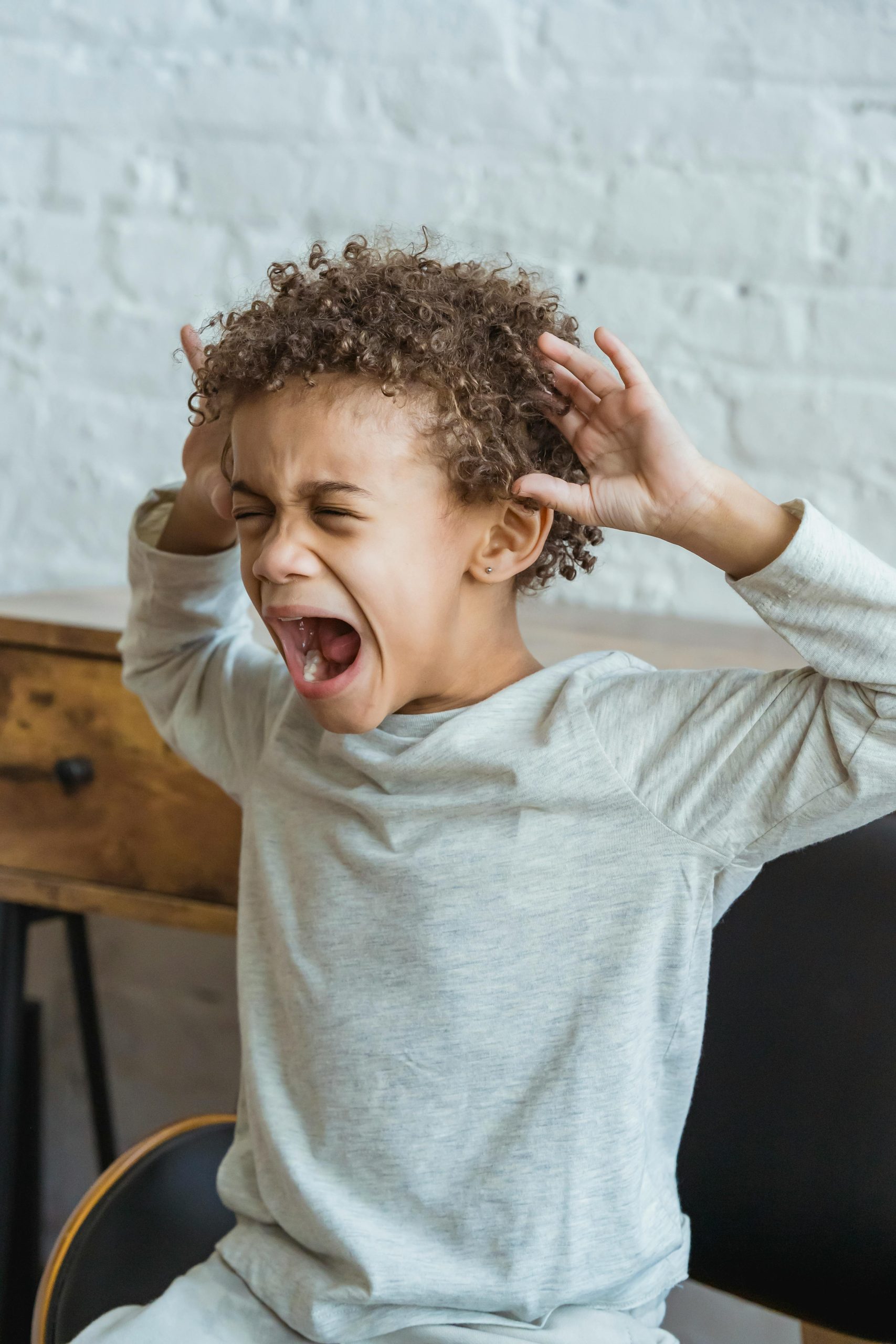 young boy crying/screaming